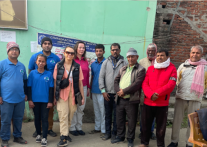 Phyllida and members of the outreach team pose for a photo.